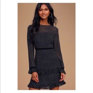 Never worn.Brand new. Lulu’s Black Dress with polka dots. Gorgeous size xs